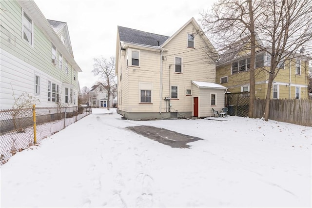 view of snow covered property