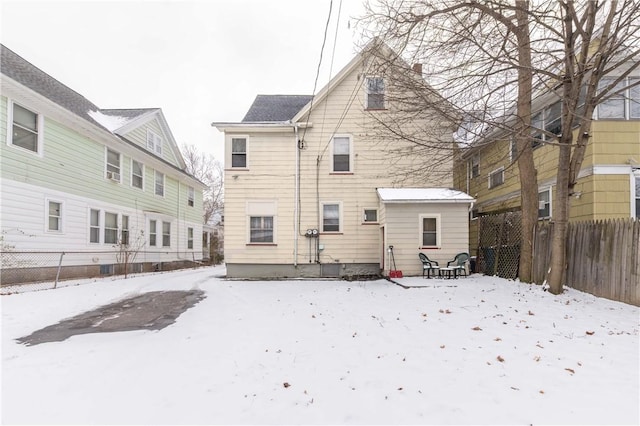 view of snow covered property