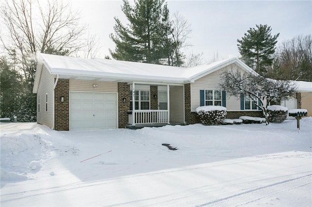 ranch-style house with covered porch and a garage