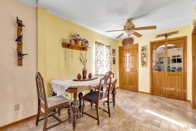 dining area with ceiling fan