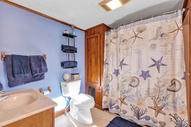 bathroom featuring toilet, tile patterned floors, ornamental molding, vanity, and curtained shower