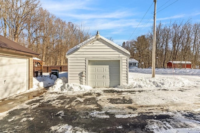 view of snow covered garage