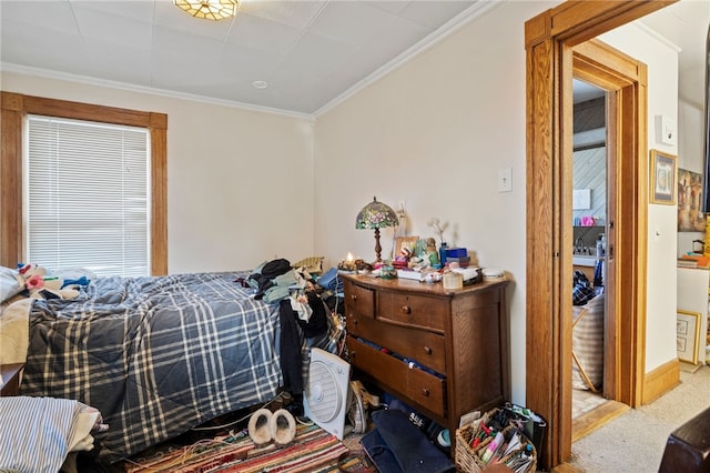 carpeted bedroom featuring ornamental molding