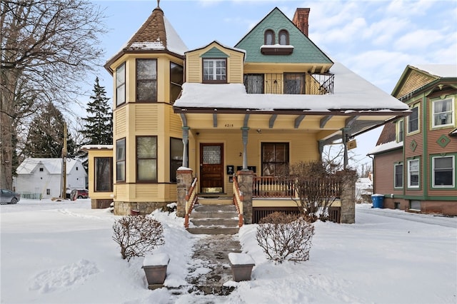 victorian home featuring covered porch