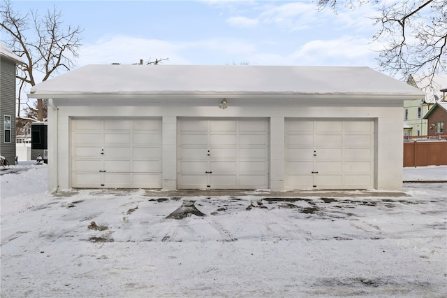 view of snow covered garage