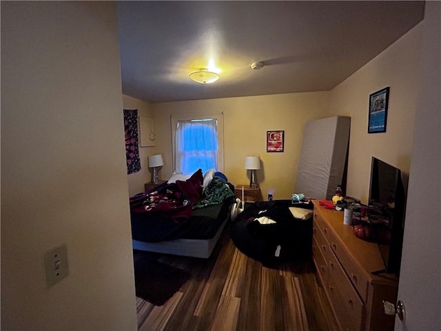 bedroom featuring wood-type flooring