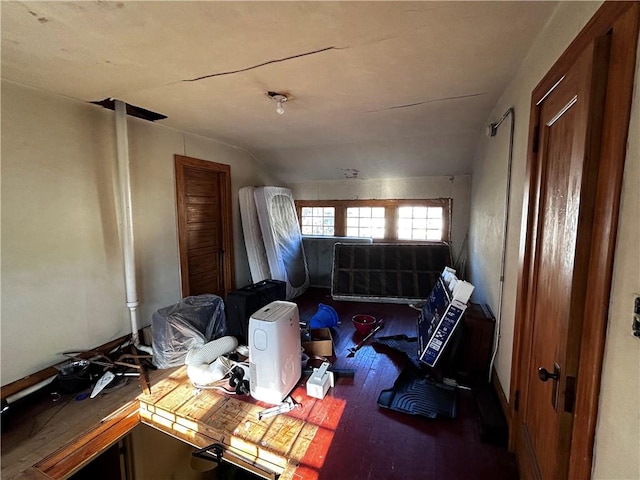 miscellaneous room featuring lofted ceiling