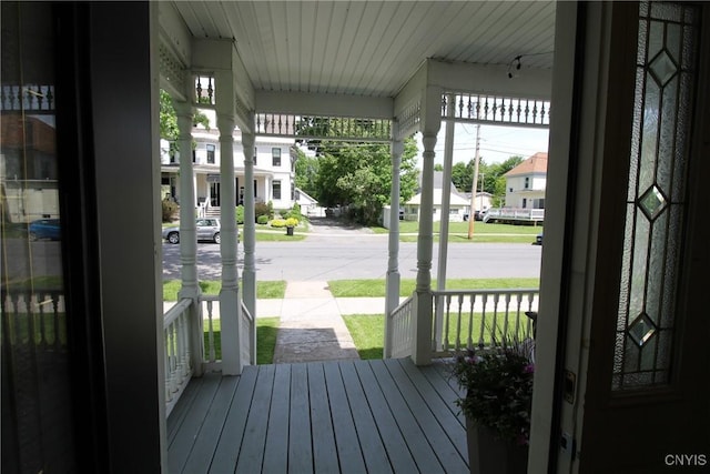 entryway with hardwood / wood-style floors