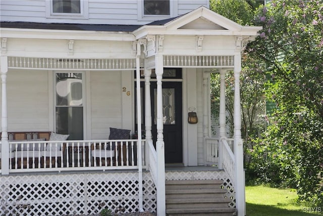 entrance to property with covered porch