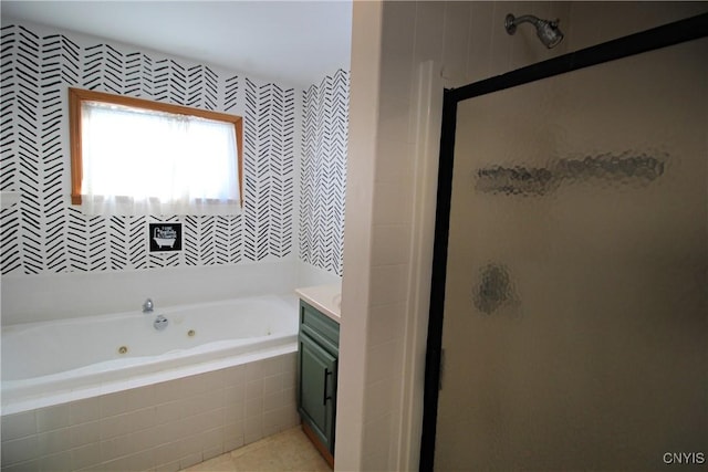 bathroom featuring independent shower and bath, tile patterned flooring, and vanity