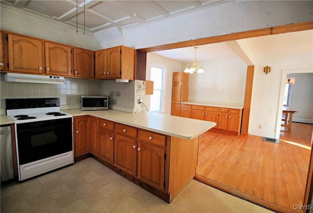 kitchen with tasteful backsplash, decorative light fixtures, an inviting chandelier, kitchen peninsula, and range with electric stovetop