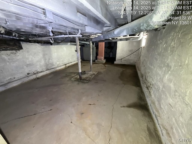 basement featuring heating unit