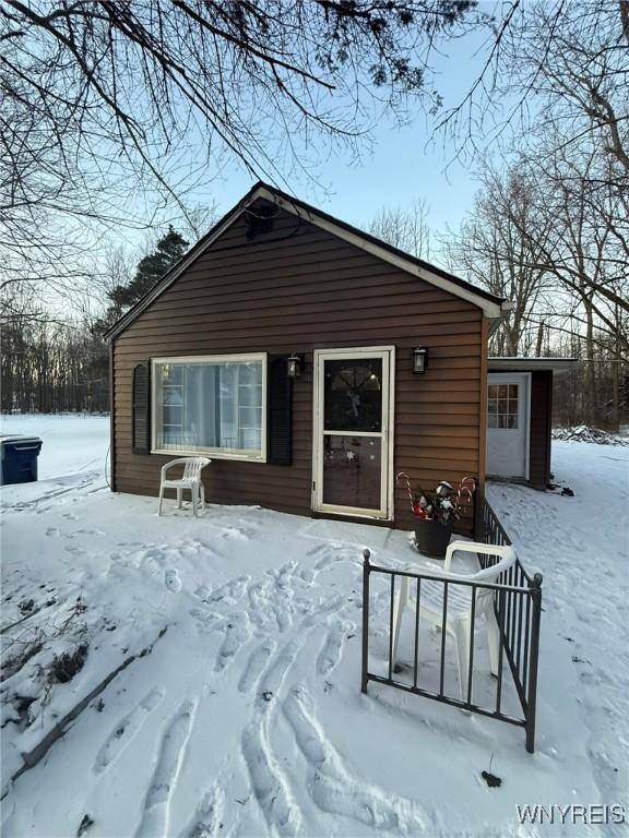 view of snow covered house