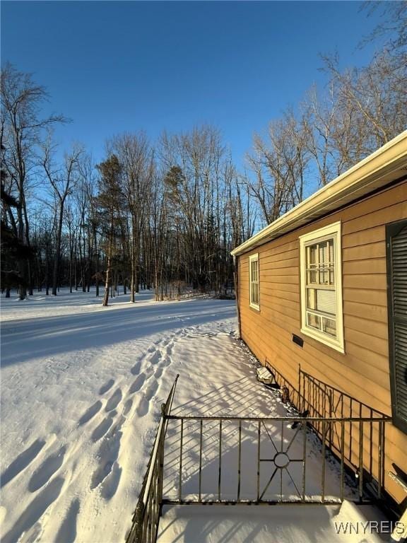 view of snow covered property