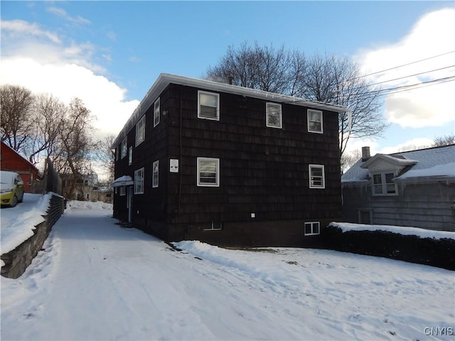 view of snow covered property