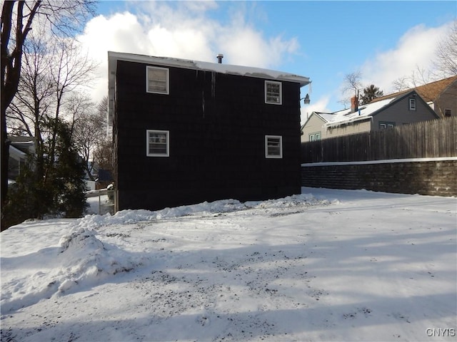 view of snow covered property