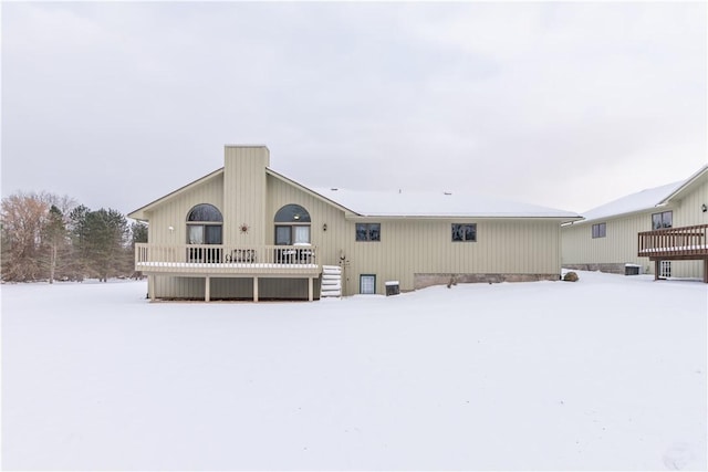 view of snow covered house