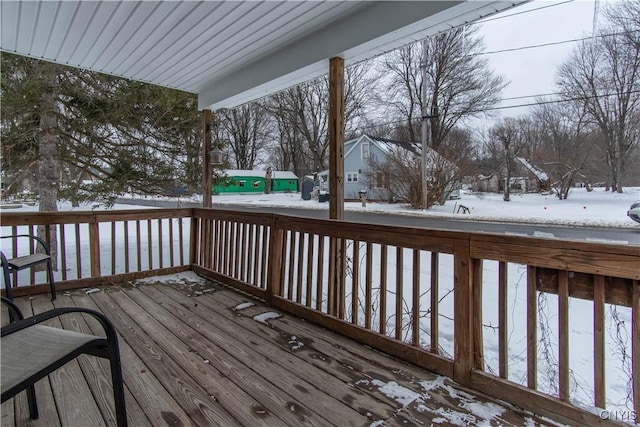 view of snow covered deck