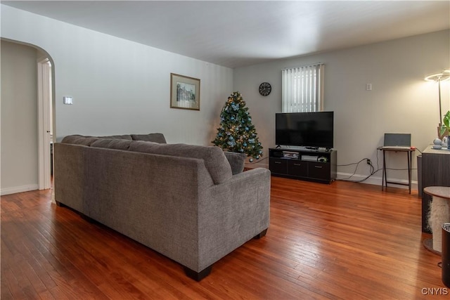 living room with dark hardwood / wood-style floors