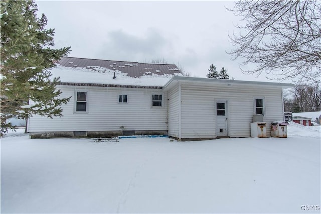 view of snow covered property