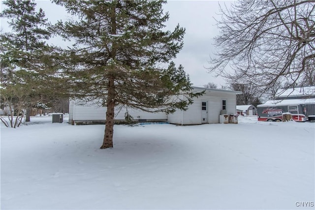 view of snow covered property