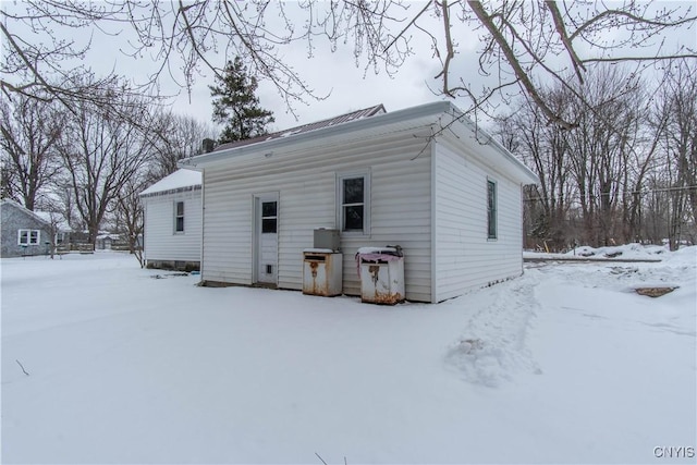 view of snow covered house