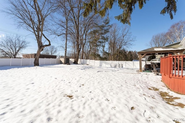 view of yard covered in snow