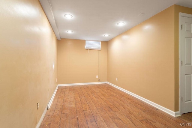 basement featuring light wood-type flooring