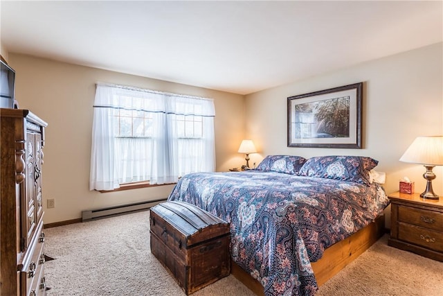 carpeted bedroom with baseboard heating