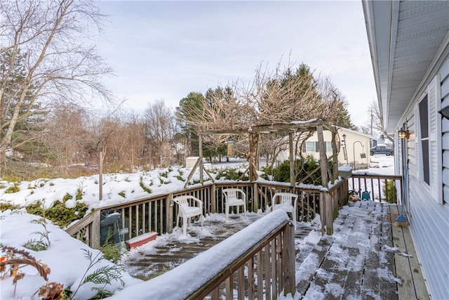 view of snow covered deck