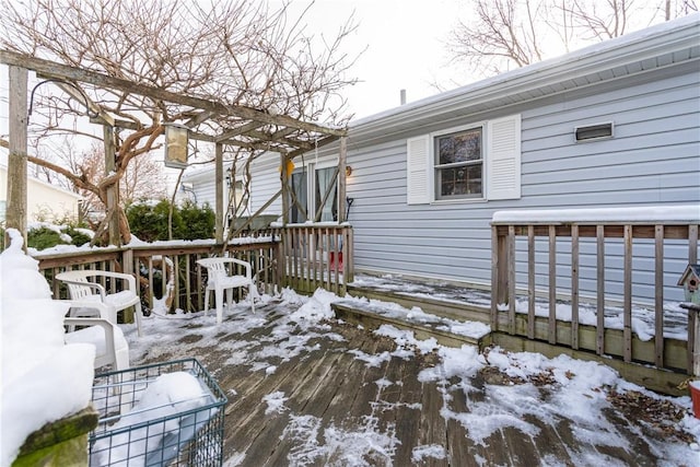 view of snow covered deck