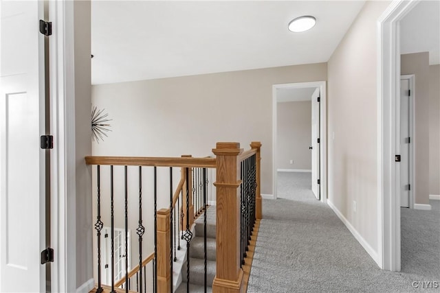 hallway featuring carpet floors