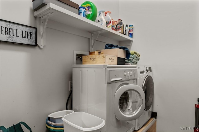 washroom with laundry area and washer and clothes dryer