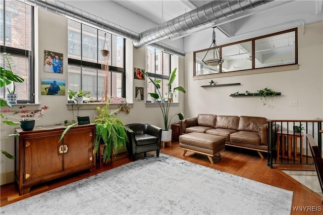 sitting room featuring light wood-style floors