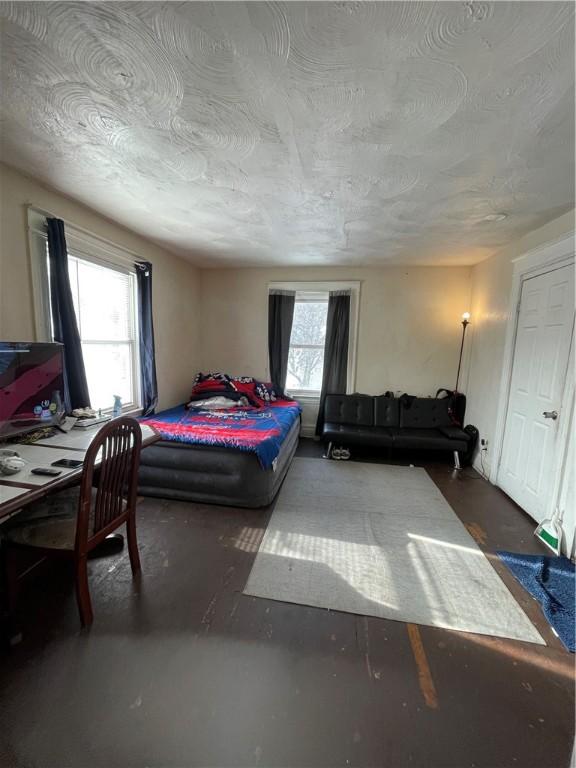 bedroom featuring a textured ceiling