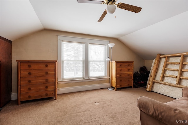 additional living space featuring lofted ceiling, ceiling fan, and carpet