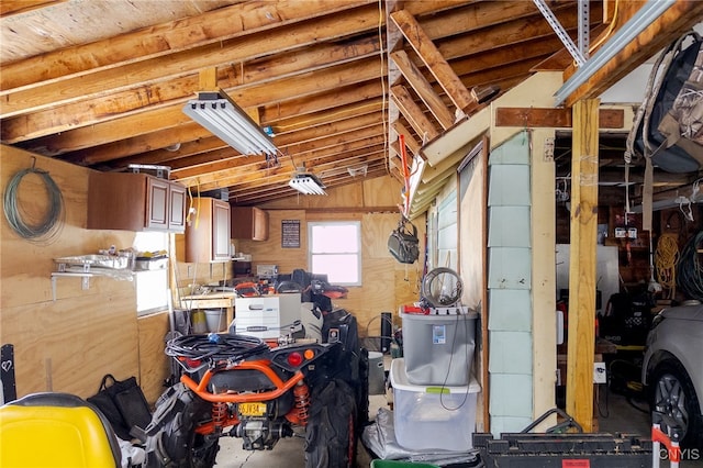 interior space featuring wood walls and vaulted ceiling