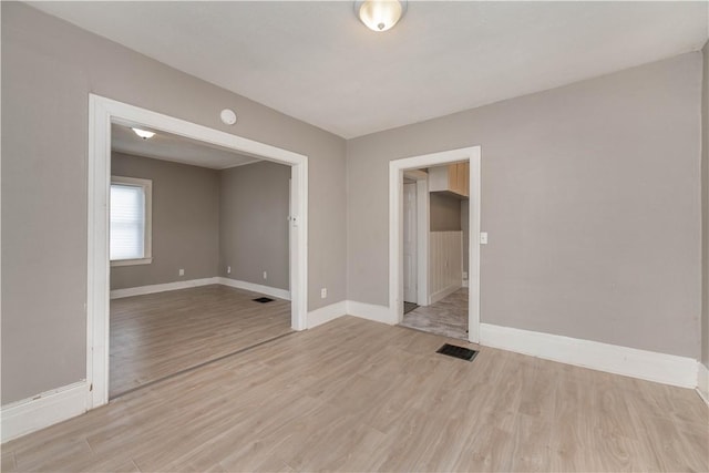 empty room featuring light hardwood / wood-style flooring