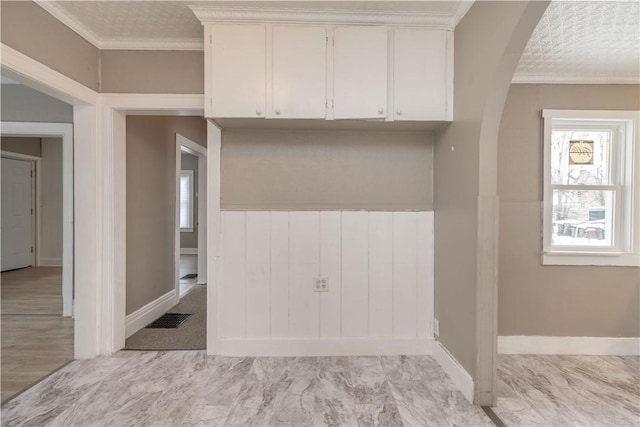 interior space featuring crown molding