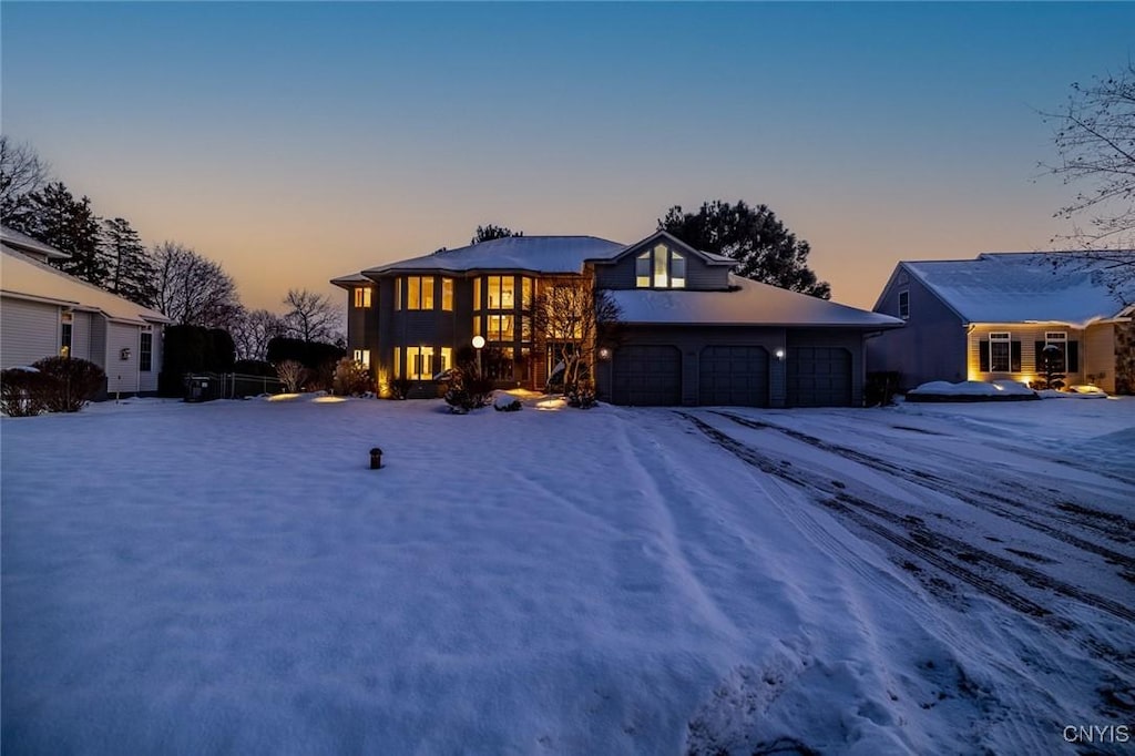 view of front of property with a garage