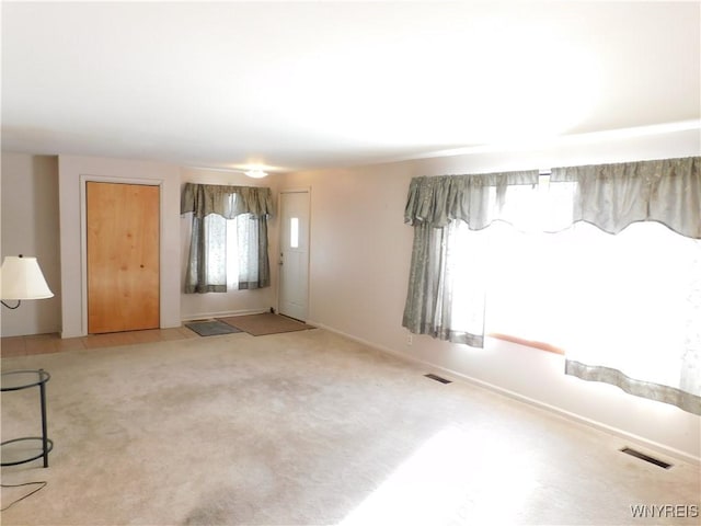 view of carpeted spare room