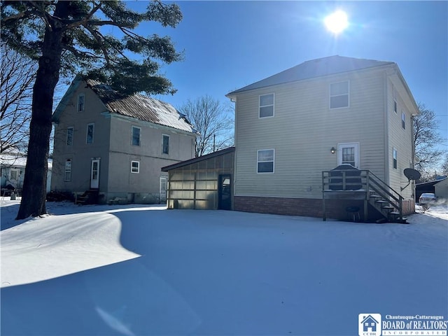 view of snow covered property