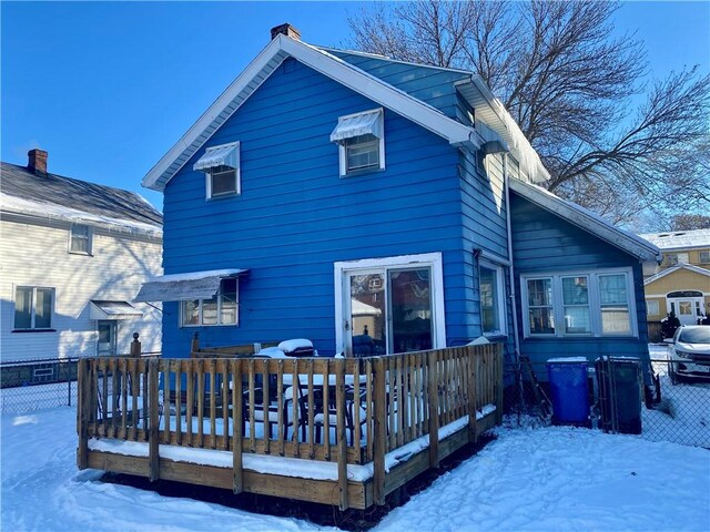 view of snow covered property