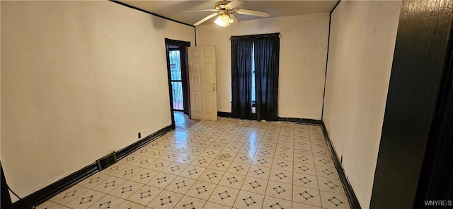 unfurnished room with ceiling fan