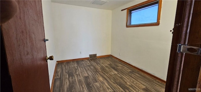 147 Montana Ave, Buffalo, NY 14211 - unfurnished room with visible vents, baseboards, and dark wood-type flooring