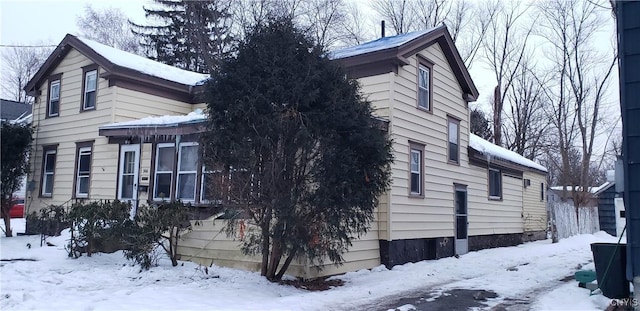 view of snow covered property