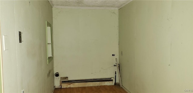 laundry room featuring wood-type flooring