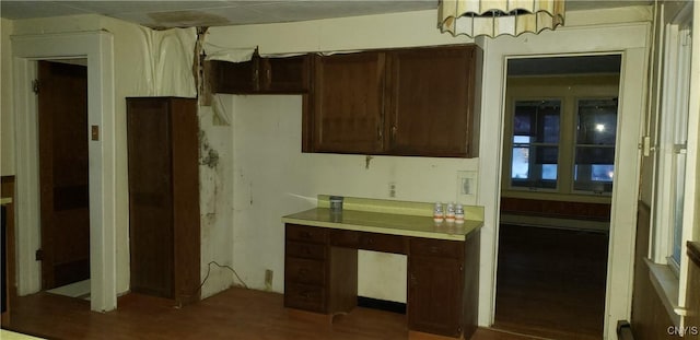 kitchen with dark brown cabinetry