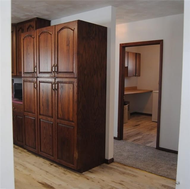 hall featuring light hardwood / wood-style flooring