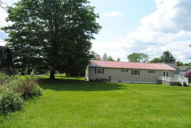 516 N Tionesta Ave, Kane Boro, PA 16735 - view of green lawn with a wooden deck